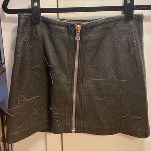 Reformation black leather star skirt